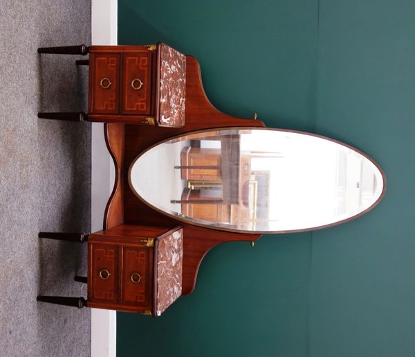 An early 20th century French gilt metal mounted kingwood banded mahogany dressing table, with large oval swing mirror flanked by a pair of marble top