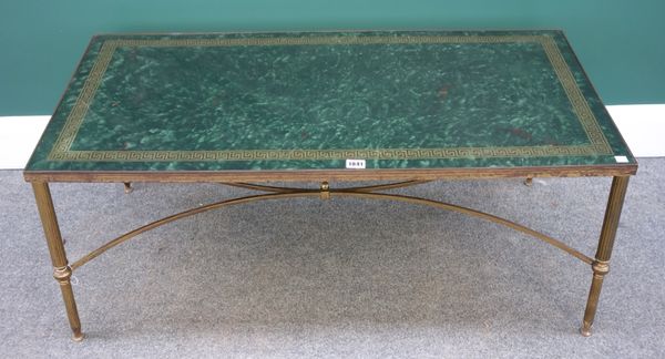 A 20th century rectangular coffee table, the faux marble top with Greek key decoration on four reeded brass supports, united by 'X' frame stretcher, 1