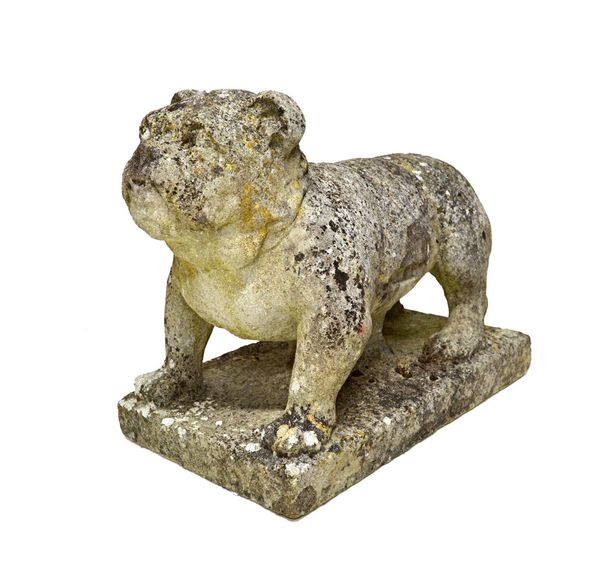 A 19th century carved stone figure of a standing bulldog, 45cm high.   Illustrated