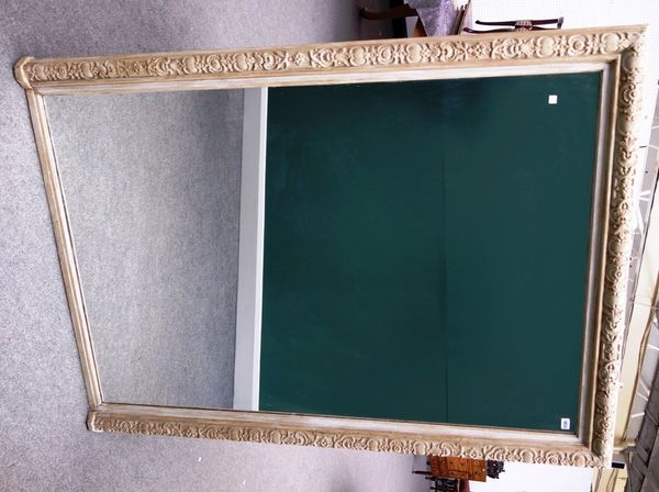 A 19th century and later rectangular wall mirror, with shell and floral carved frame, 124cm wide x 168cm high.