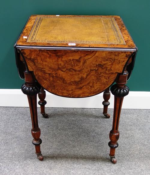 A Victorian figured walnut ebonised shaped square drop flap games table, with corner pull-out sides with dished gaming wells, 57cm wide, 109cm wide wh