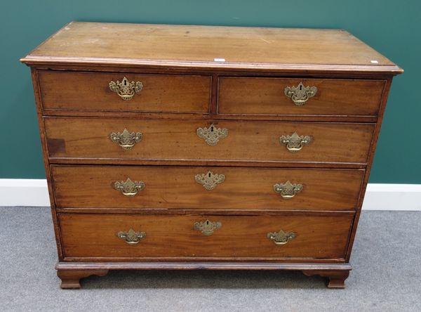 A George III mahogany chest of two short and three long graduated drawers on ogee bracket feet, 116cm wide.