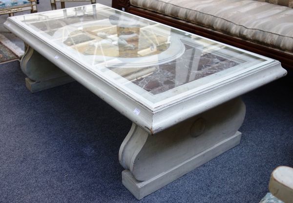 A rectangular coffee table, the 19th century Italian specimen marble inlaid top with central cartouche centred by a cross (64cm wide x 138cm) mounted