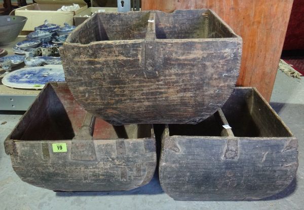 A group of three hardwood and metal band trugs.