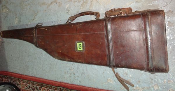 A 19th century brown leather 'leg of mutton' gun case.
