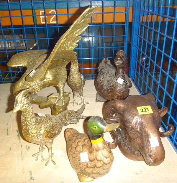 A quantity of 20th century cast metal models of birds and animals, including eagles, a ram's head, a duck and sundry.