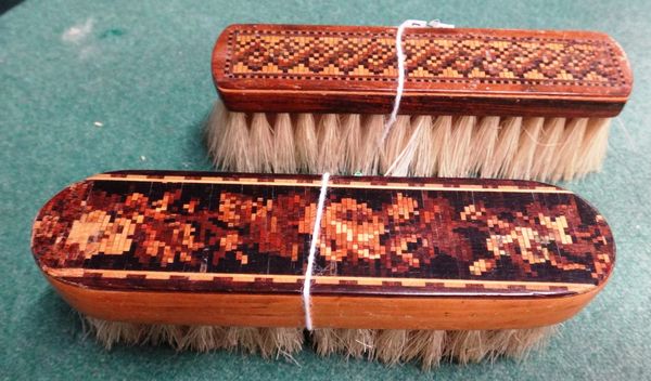 A late Victorian Tunbridge Ware rosewood and parquetry table brush with mosaic top, 10.5cms wide; and another Tunbridge Ware brush (2)