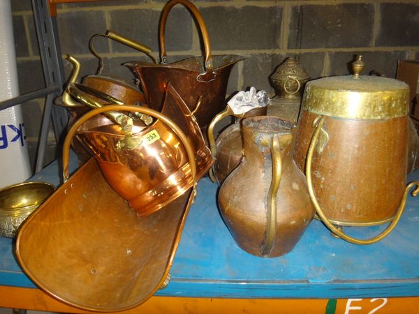 A quantity of large copper and brass items, including log baskets, coal scuttles, jugs and sundry.
