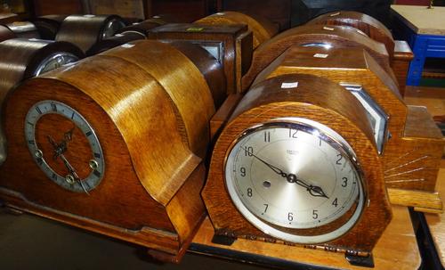 A group of sixteen assorted early 20th century mantel clocks.