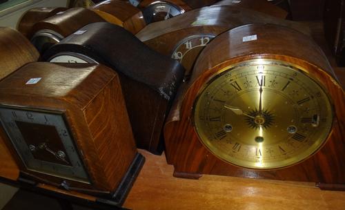 A group of fifteen assorted early 20th century mantel clocks.