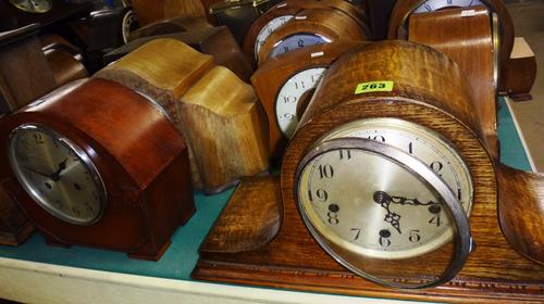 A group of fifteen assorted early 20th century mantel clocks.