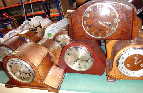 A group of fifteen assorted early 20th century mantel clocks.
