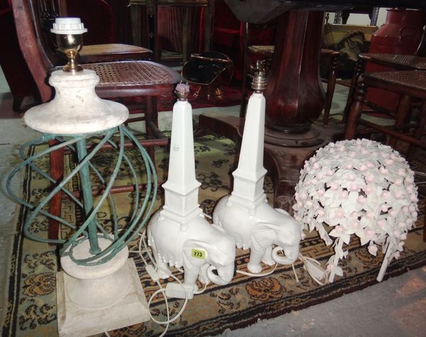 A group of 20th century table lamps, including; two white ceramic elephant lamps, a metal spiral twist lamp and two metal floral lamps.