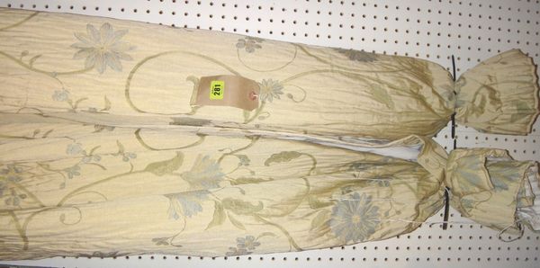 A pair of cream floral decorated curtains, John Lewis each 175 drop and 145cm wide.