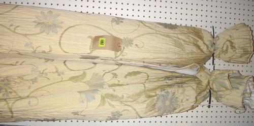 A pair of cream floral decorated curtains, John Lewis each 175 drop and 145cm wide.