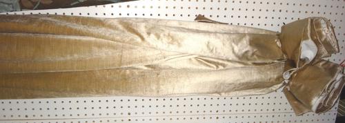 A pair of gold velvet curtains, 220 drop x 225cm wide.