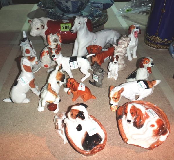 A quantity of Doulton, Beswick and Austrian ceramic dogs.