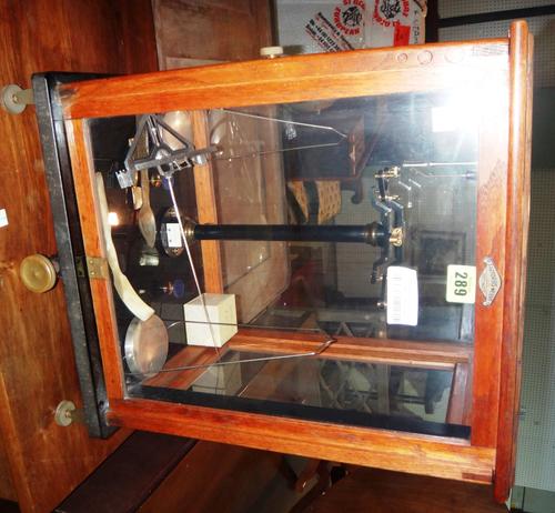 A precision chemical balance, early 20th century.