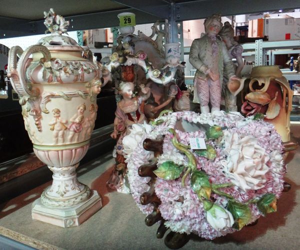 A group of 19th century and later Continental porcelain, including a Meissen style figure group, a floral encrusted candelabra, a pot pourri vase and
