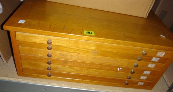 A 20th century six drawer collector's chest.