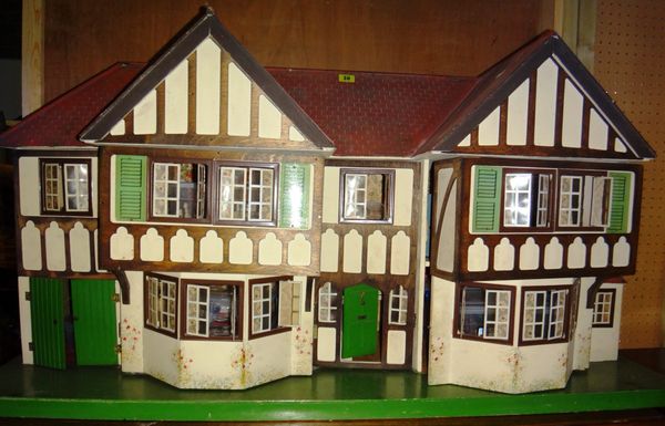 An early 20th century Tudor style dolls house.