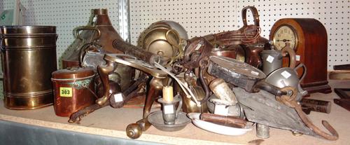 A quantity of metal wares including, a pewter tea set, copper and brass lidded pots, trivets, ladles and sundry.