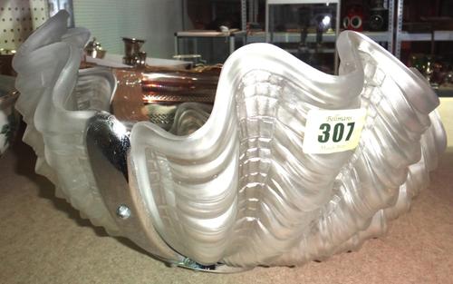 A frosted glass ceiling light and two wall lights.