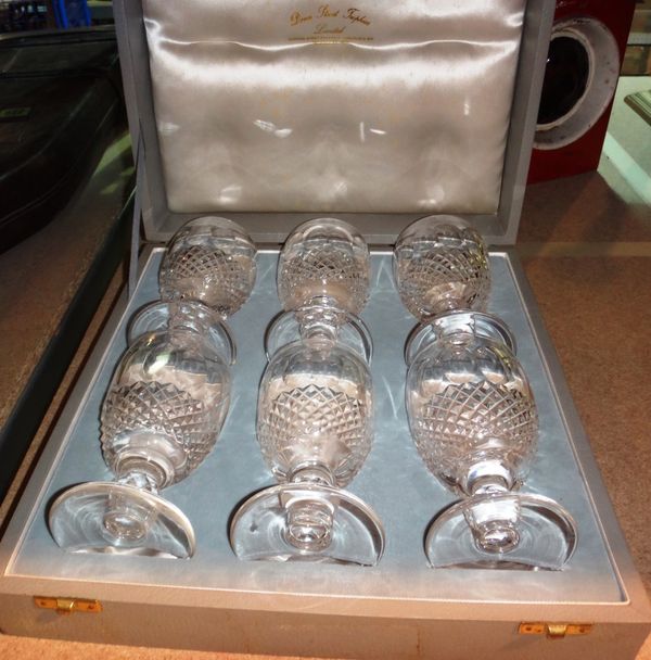 A cased set of six Waterford glasses.