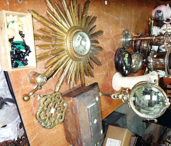 A group of collectables including a sunburst wall clock, a brass pedestal mirror, a rosewood tea caddy, a chess set and sundry.