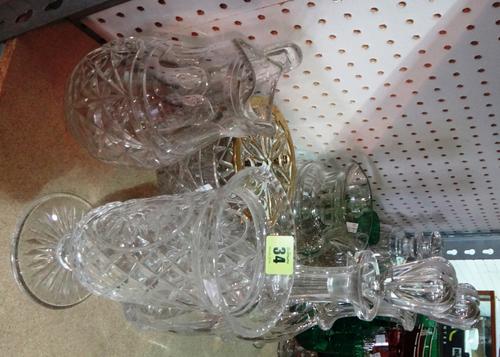A group of glassware, mainly cut glass including decanters, bowls, vases, glasses and sundry.