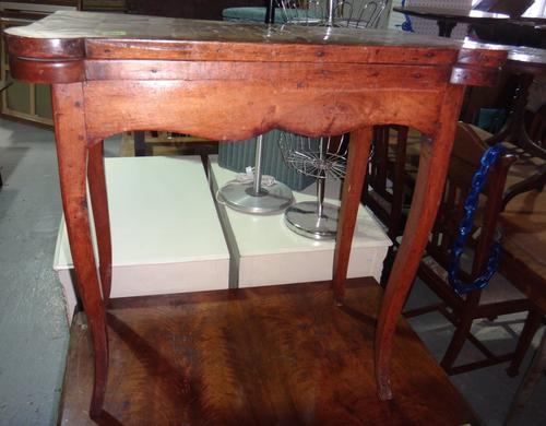 A 19th century kingwood and inlaid foldover games table.
