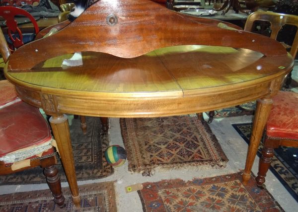 An oval beech dining table.