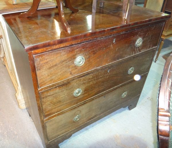 A 19th century mahogany chest of three long drawers.