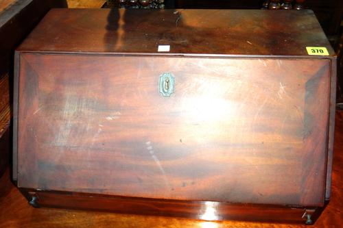 A 19th century mahogany desk top bureau with fitted interior and a toilet mirror. (2)