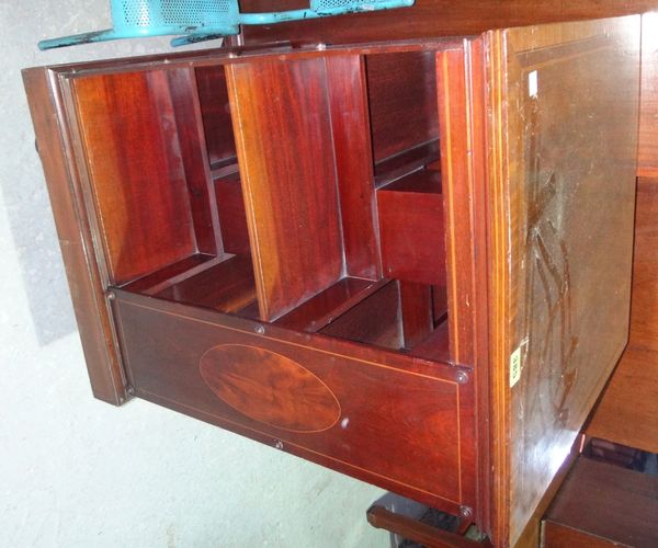 A 19th century mahogany and inlaid revolving bookcase.  8.8