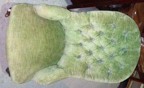 A 19th century green button upholstered nursing chair and a pair of rush seated dining chairs. (2)