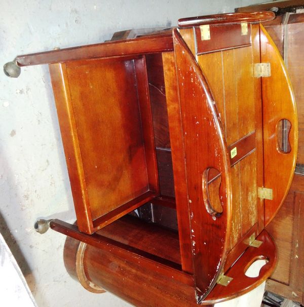 A 20th century mahogany butler's tray on trolley.