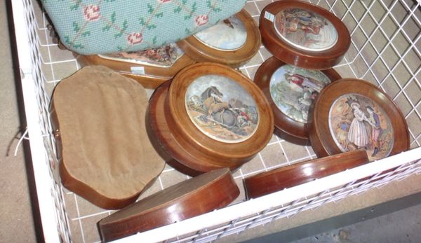 A group of ten assorted Prattware pot lids in wooden frames.