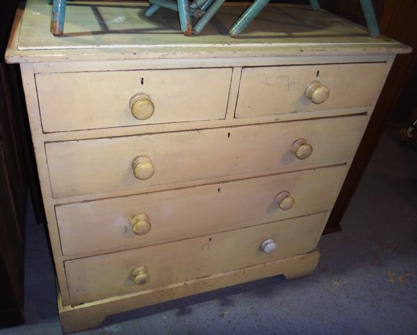 A white painted pine chest of two short and three long drawers.