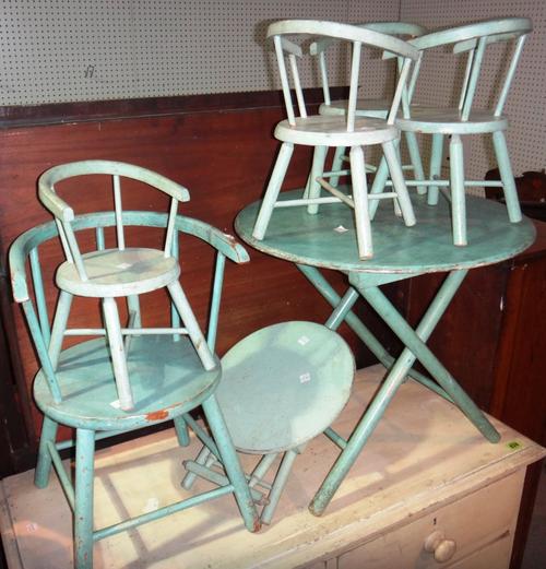 Seven blue painted child's chairs, two matching small tables, a miniature wheelbarrow and another child's chair. (11)