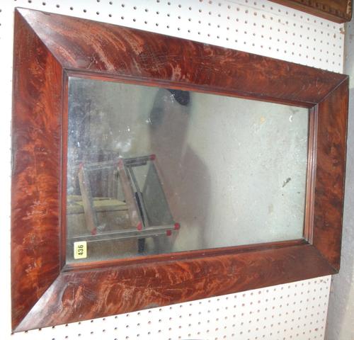 A 19th century mahogany wall mirror and a standard lamp. (2)
