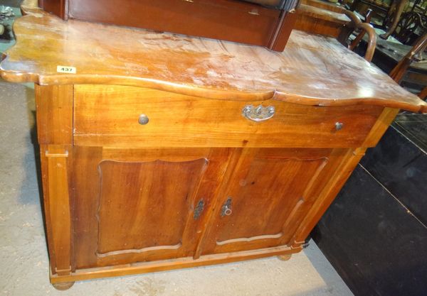 A 19th century French fruitwood side cabinet.