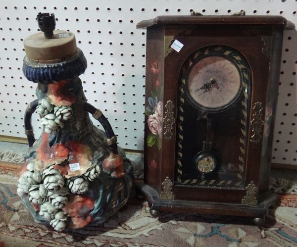 A group of three table lamps, and a 20th century mantel clock in a painted case. (4)