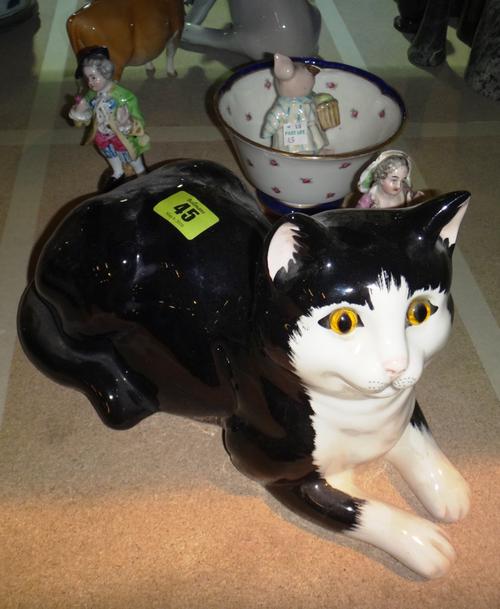 A black ceramic model of a cat, two Continental porcelain figures of a man and a lady, a Beatrix Potter pig figure and sundry. (qty)