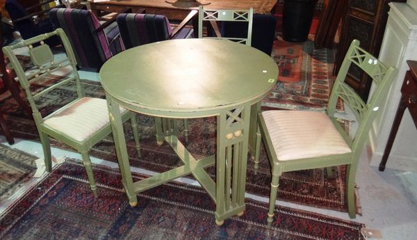 A green and parcel gilt circular table in the manner of J & J Kohn and three similar chairs. (4)