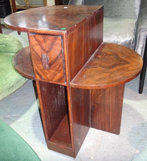 A 20th century walnut Art Deco occasional table and a 20th century corner cabinet.