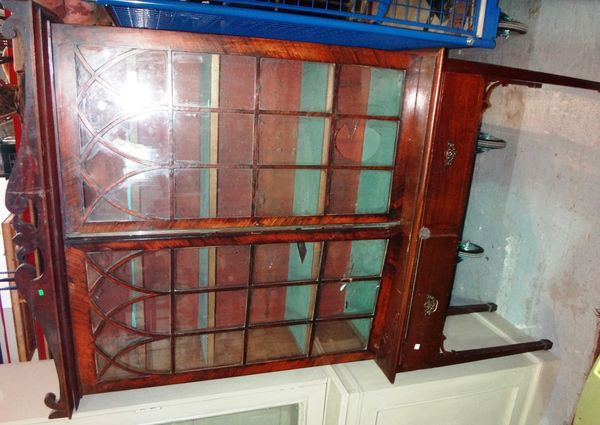 A 19th century mahogany glazed bookcase with associated mahogany base.