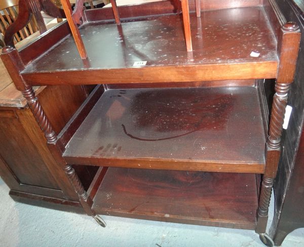 A mahogany tea trolley, a toilet mirror and two stools. (4)