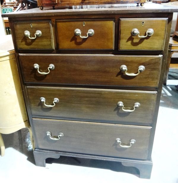 A 20th century mahogany chest with three short and three long drawers.