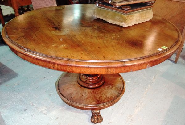 A 19th century mahogany circular dining table.